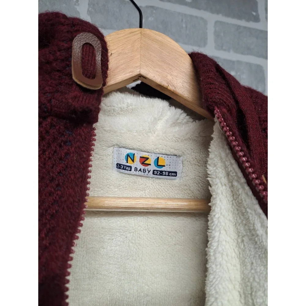 N Z L baby burgundy